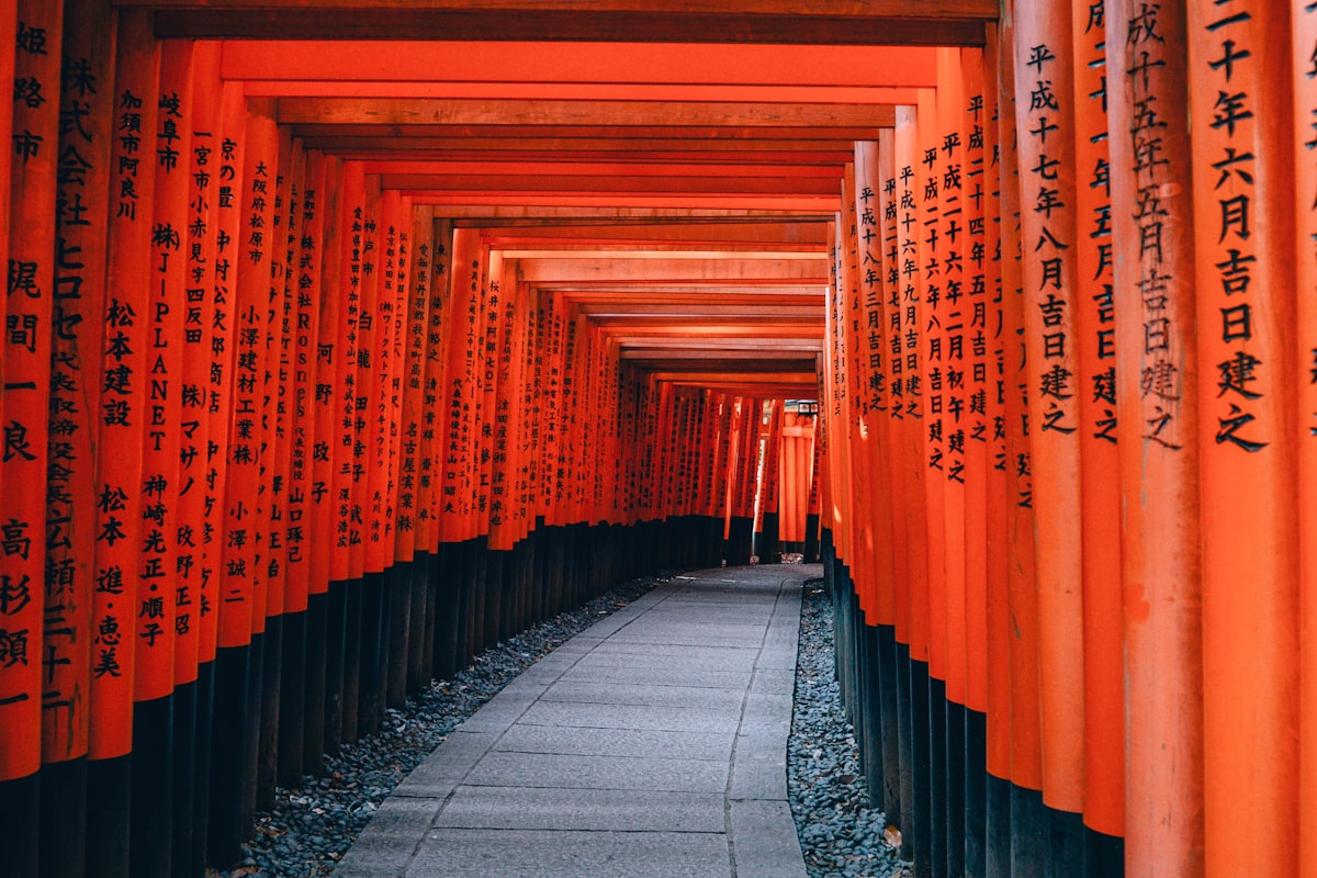 Red torii gates at Fushimi Inari shrine in Kyoto Japan